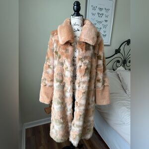Unreal Fur Women's Coat in Tan and Cream.